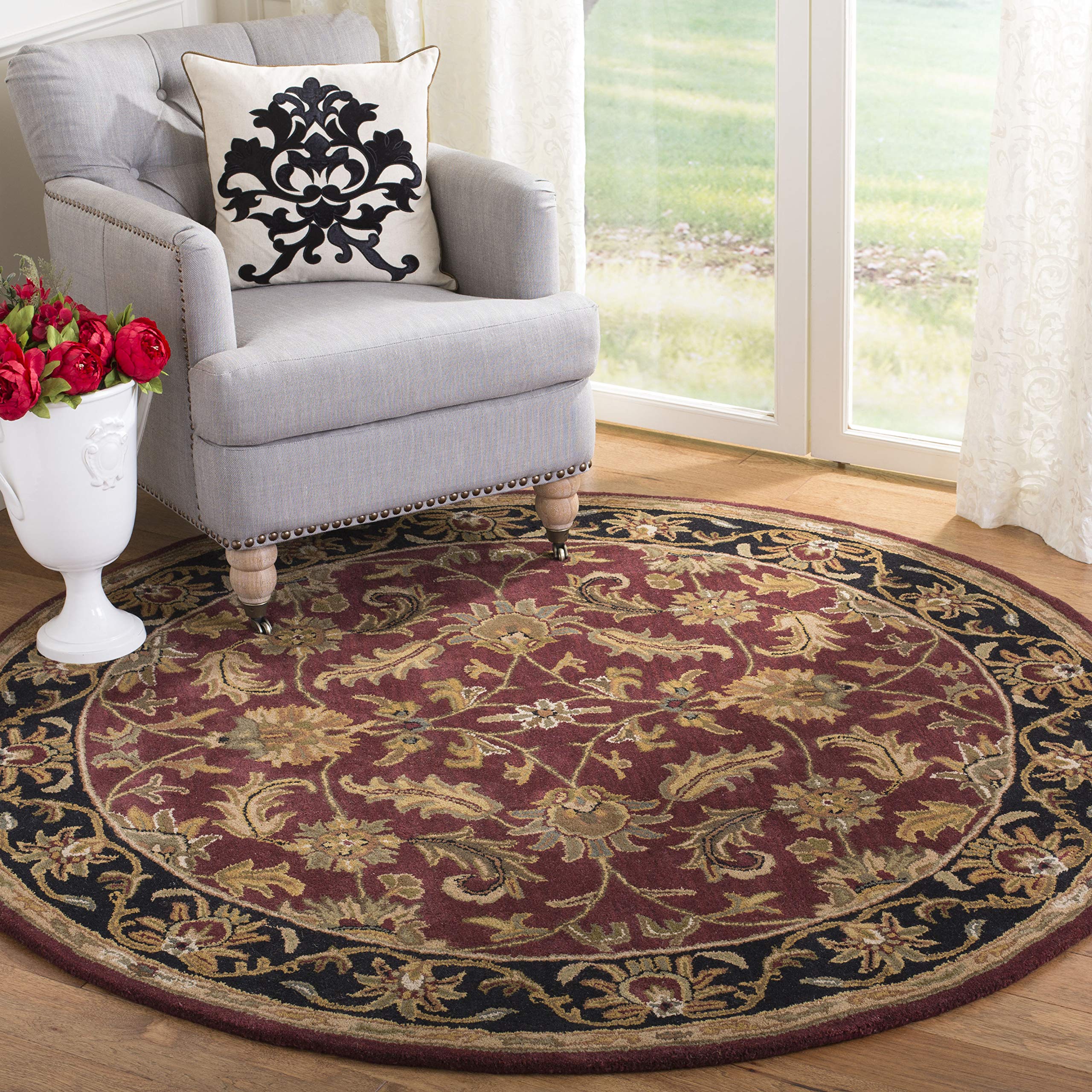 SAFAVIEH Heritage Collection Area Rug - 9' x 12', Black & Beige, Handmade Traditional Oriental Wool, Ideal for High Traffic Areas in Living Room, Bedroom (HG628B)